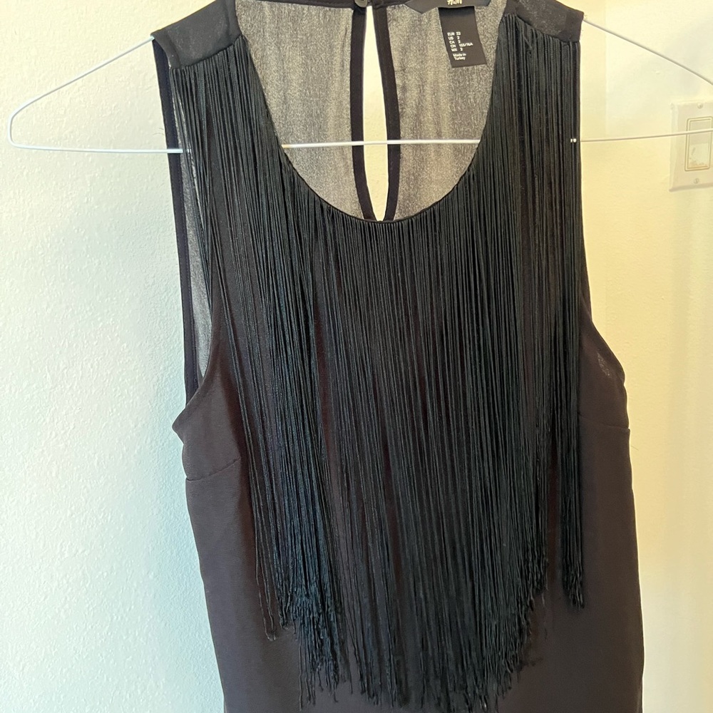 Black top with fringes
